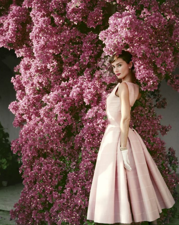 Norman Parkinson, Audrey Hepburn wearing a Givenchy afternoon cocktail dress, Italy, 1955.