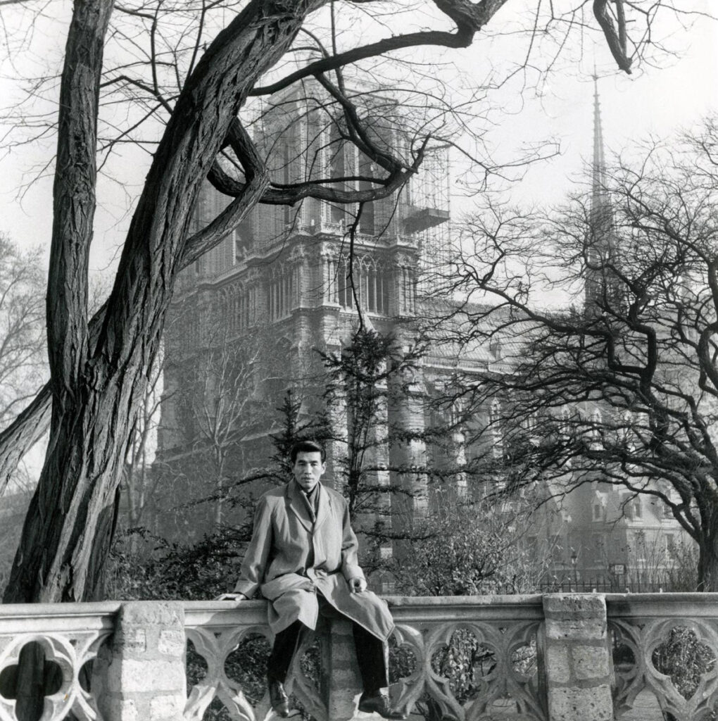 Chu Teh-Chun: Chu Teh-Chun in front of Notre Dame, Paris, France, 1955. Photo courtesy of the Fondation CHU Teh-Chun.
