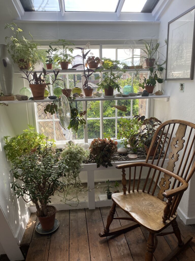 Kettle's Yard: Plants and a seesaw chair near the window, Kettle’s Yard, University of Cambridge, Cambridge, UK. Photo by the author.

