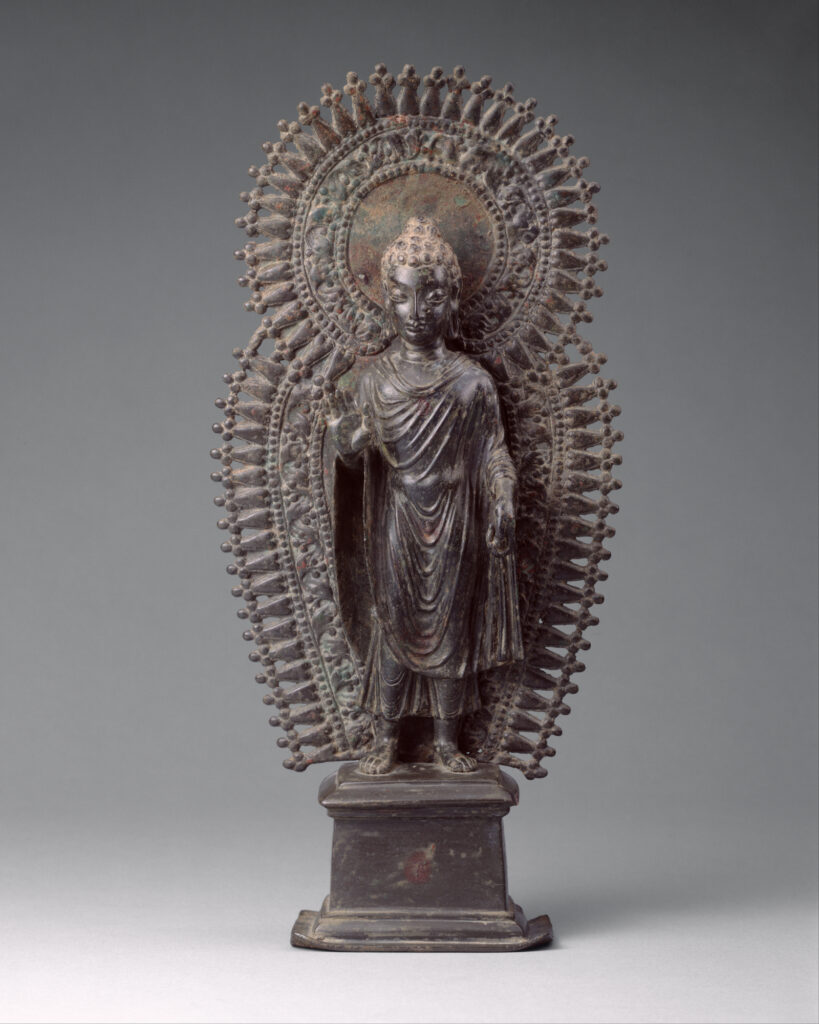 Gandhara: Standing Buddha with radiate combined halo, ca. late 6th century CE, ancient Ganhara (today’s Pakistan), Metropolitan Museum of Art, New York City, NY, USA.
