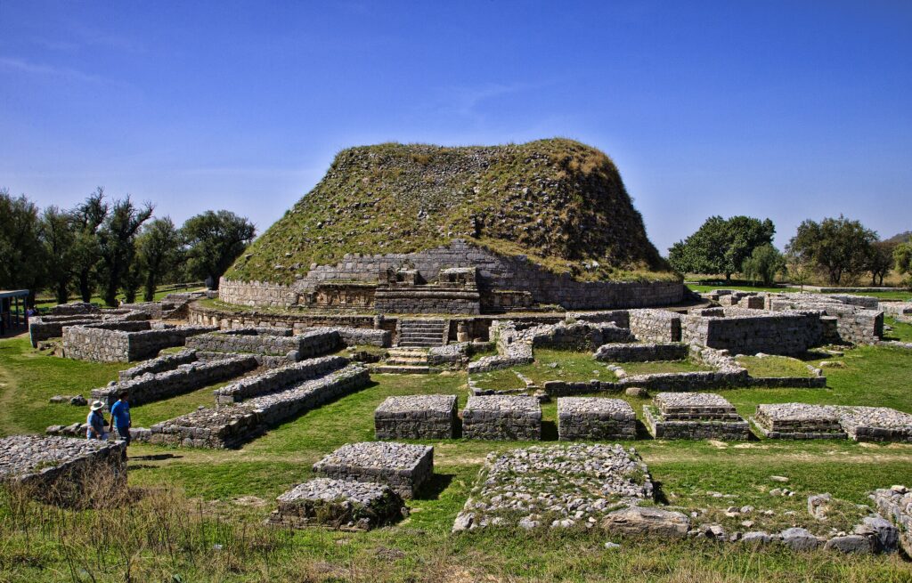 Gandhara: Dharmarajika stupa, Taxila, Pakistan. Photograph by Sasha Isachenko via Wikimedia Commons (CC-BY-SA-3.0).
