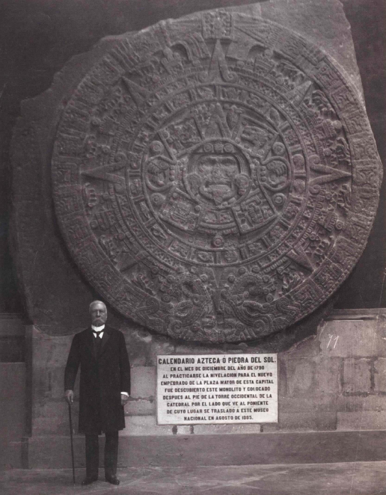 aztec art: Sun stone (Aztec calendar) and president Porfirio Diaz, 1910, Photograph by A.Carrillo/AGN México via Wikimedia Commons (public domain).
