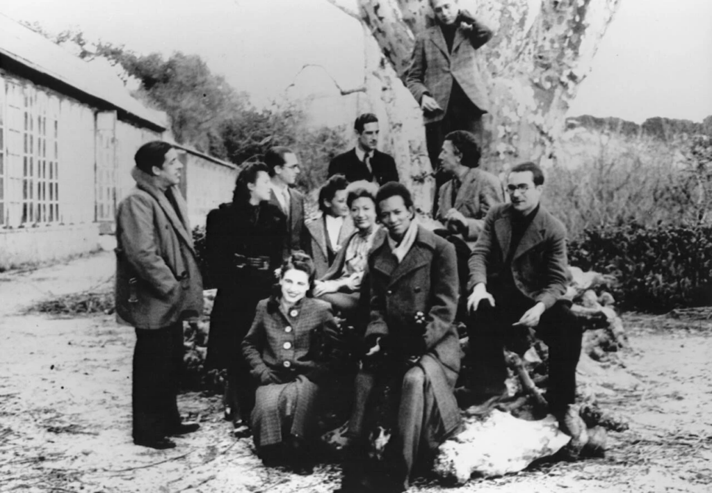 Varian Fry: A group of artists, including André and Jacqueline Breton, Jacques Herold, Oscar Dominguez, and Wifredo and Helene Lam pause for a photo on the grounds of Villa Air-Bel. Photo: United States Holocaust Museum, Courtesy of Cynthia Jaffee McCabe.
