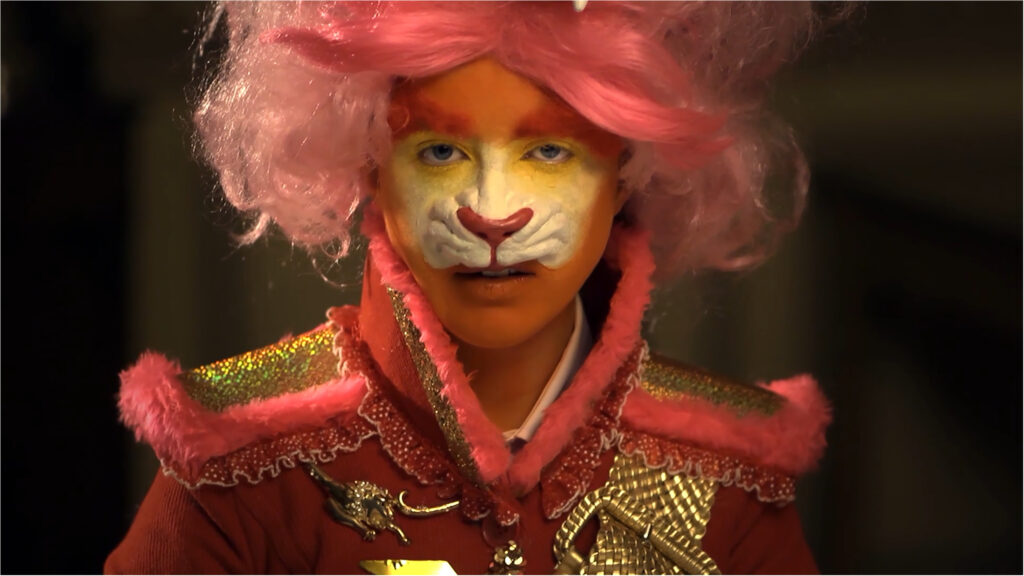 Friends in Love and War: Rachel Maclean, The Lion and The Unicorn, 2012. Single channel HD video, colour and sound. 11 minutes 30 seconds. © Rachel Maclean, 2012, commissioned by The Edinburgh Printmakers. Courtesy of British Council Collection.
