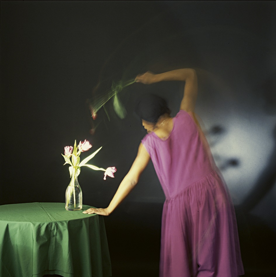 photographing britain: Joy Gregory, Magenta Dress with Pink Tulips, 1984. Courtesy of the Artist. © Joy Gregory. All rights reserved, DACS.
