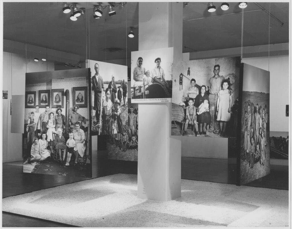 Dorothea Lange Family of Man: Installation view of The Family of Man exhibition, 1955, Museum of Modern Art, New York City, NY, USA. Photograph by Ezra Stoller. Museum’s website.
