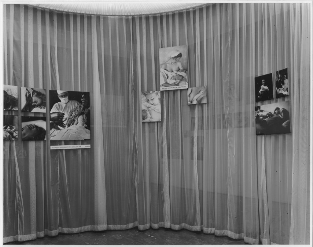 Dorothea Lange Family of Man: Installation view of The Family of Man exhibition, 1955, Museum of Modern Art, New York City, NY, USA. Photograph by Ezra Stoller. Museum’s website.
